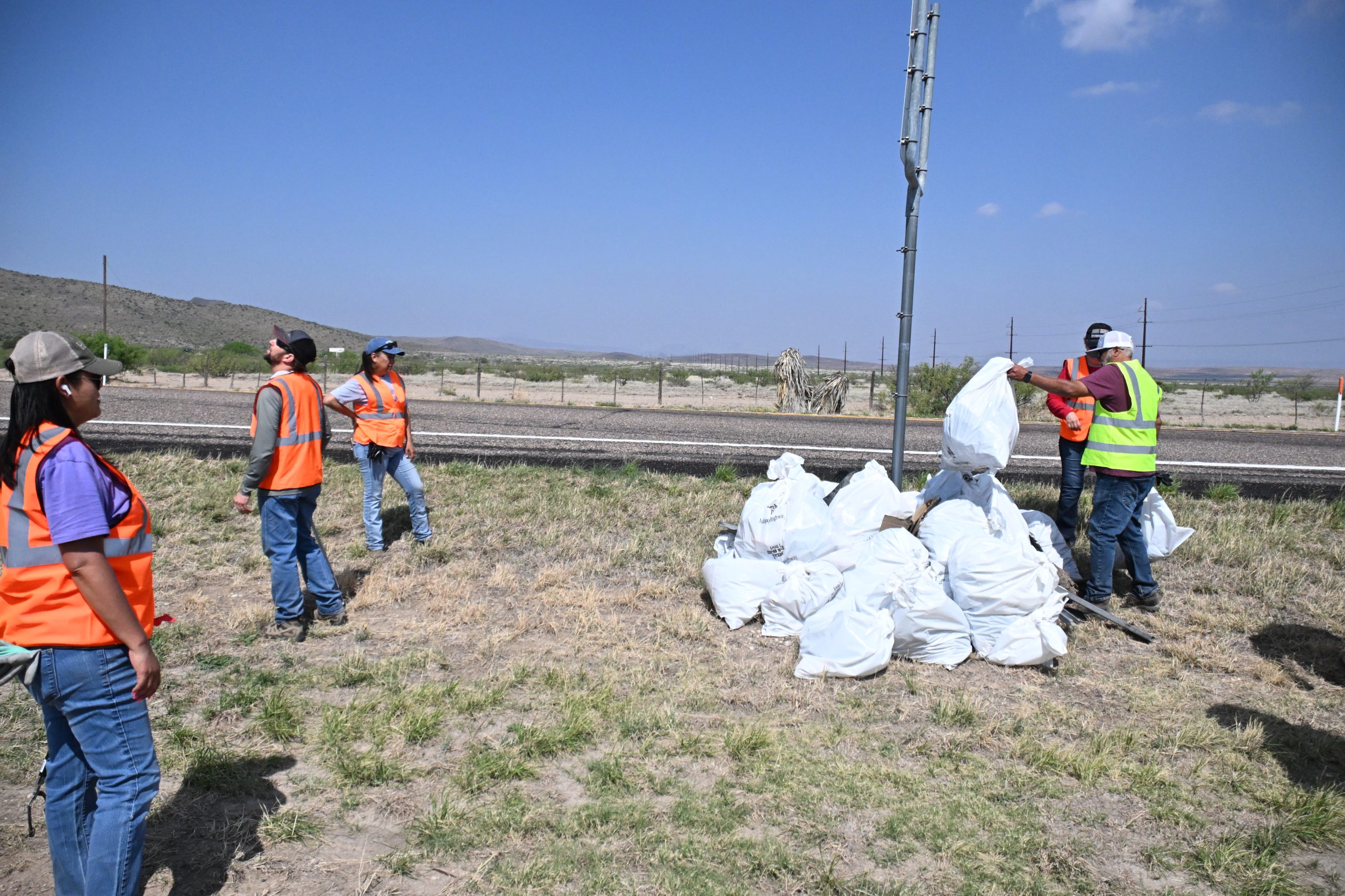 BBT Volunteers Stacking Trash